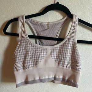 Pastel purple and pink knit sports bra by Varley